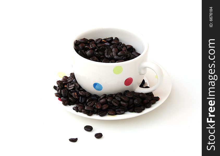 Coffee cup on white with fresh coffee beans