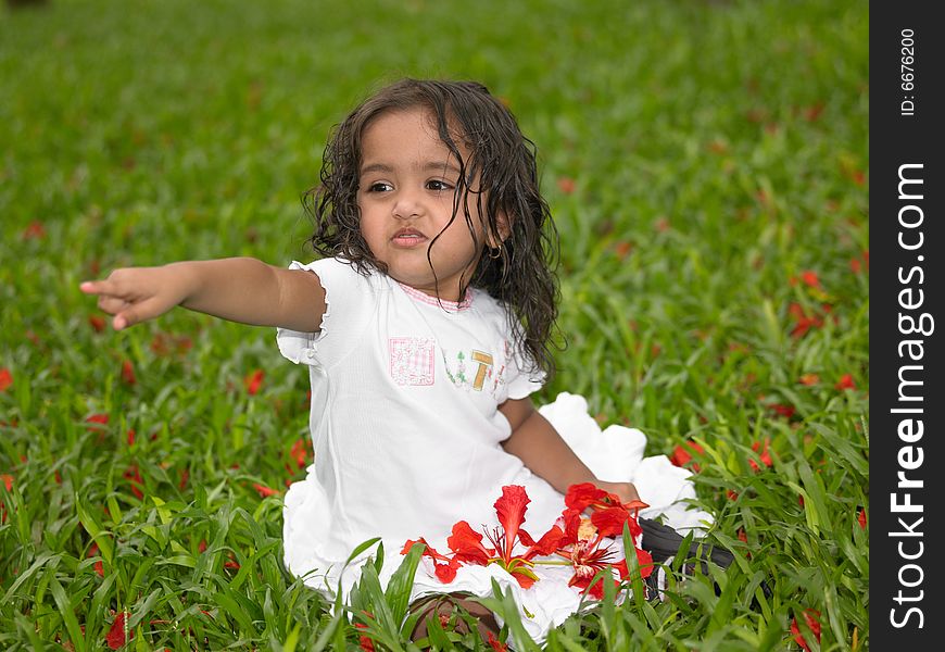 Asian girl of indian origin in the garden. Asian girl of indian origin in the garden