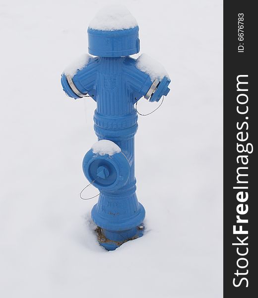 Blue fire hydrant in winter, covered in snow

*RAW format available