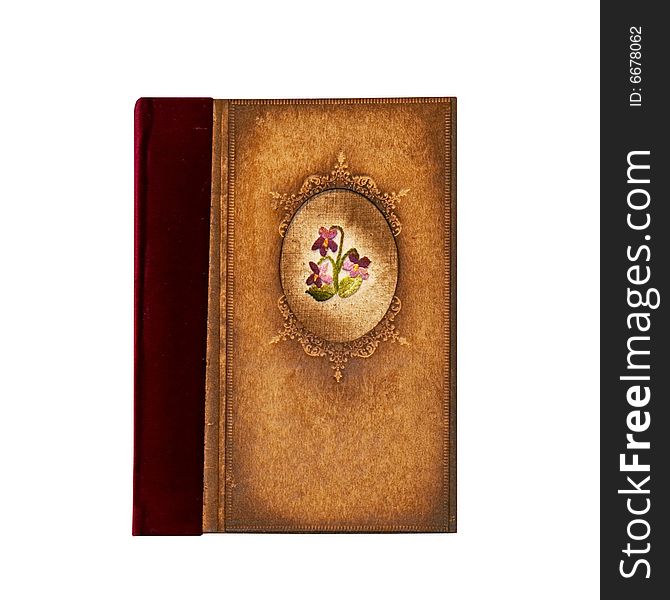 Grunge notebook cover with floral needlework isolated. Grunge notebook cover with floral needlework isolated