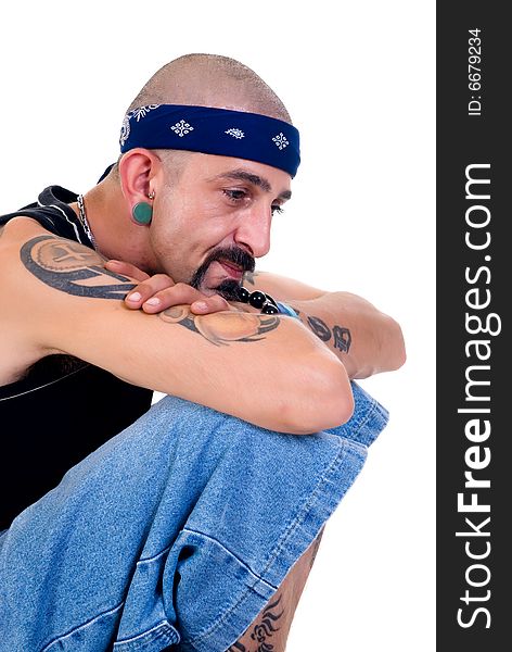 Portrait of a man with alternative lifestyle, studio shot, white background