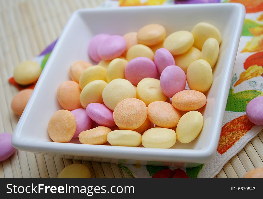 Some colourful sweet candies in a bowl