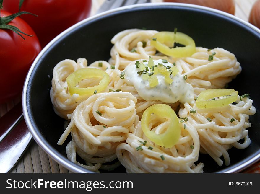 Italian noodles with cheese sauce and paprika. Italian noodles with cheese sauce and paprika