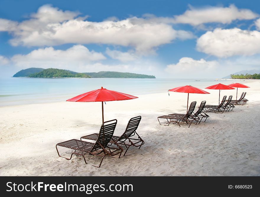 Empty sand beach over sky background