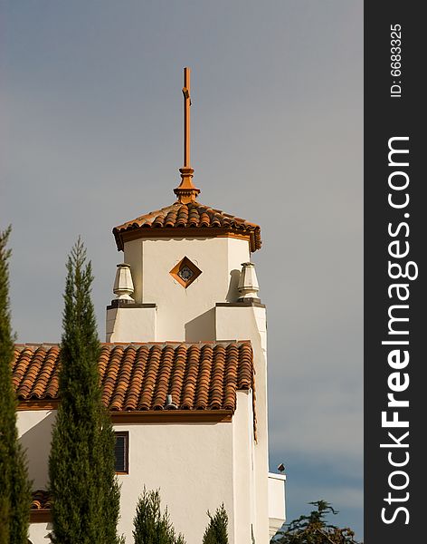 Beautiful Mission style church with tower against blue California sky. Beautiful Mission style church with tower against blue California sky