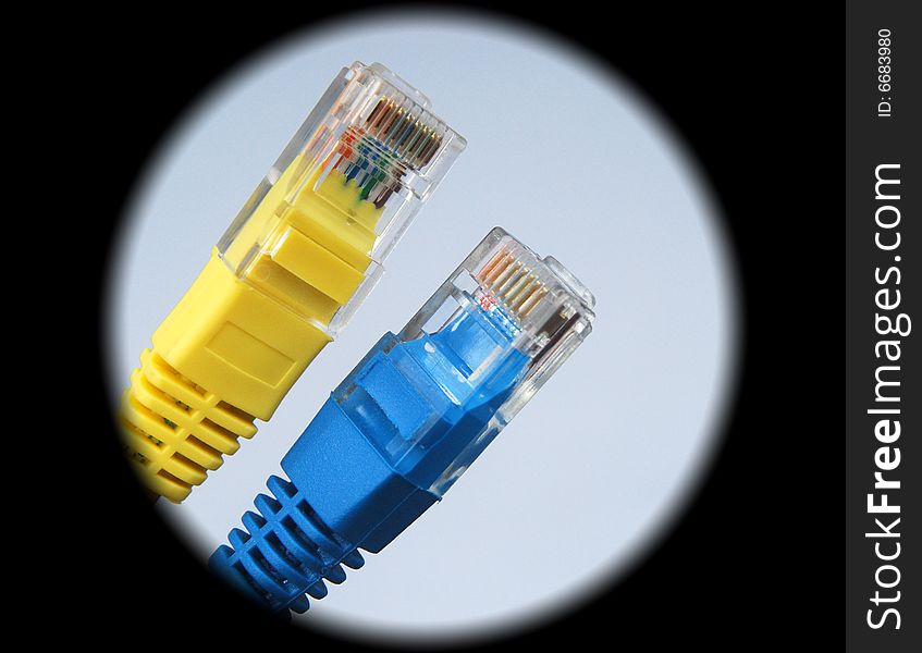 Closeup of yellow and blue internet plugs