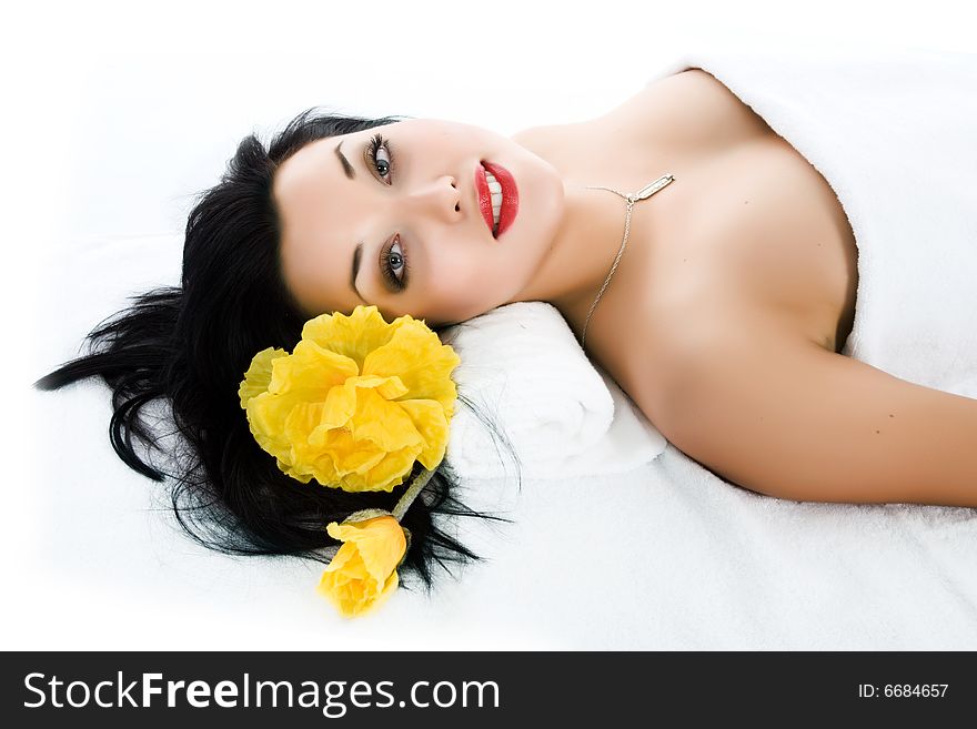 Attractive woman getting spa treatment on white