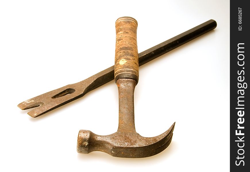 Old tools hammer and pry bar for construction