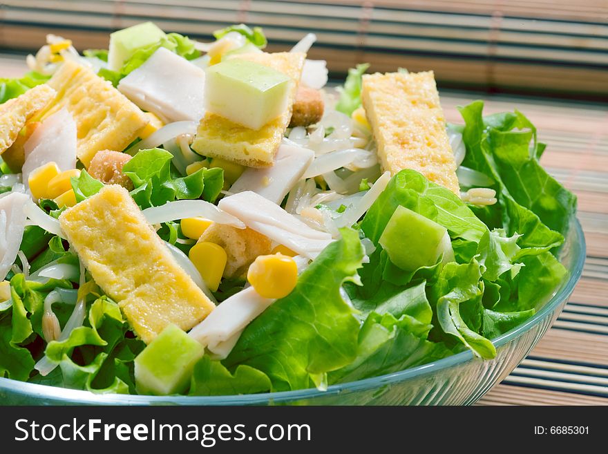 Lettuce salad with sweet corn and turkey ham. Lettuce salad with sweet corn and turkey ham