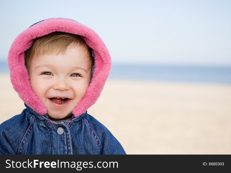 Portrait of sweet and happy baby girl outdoor