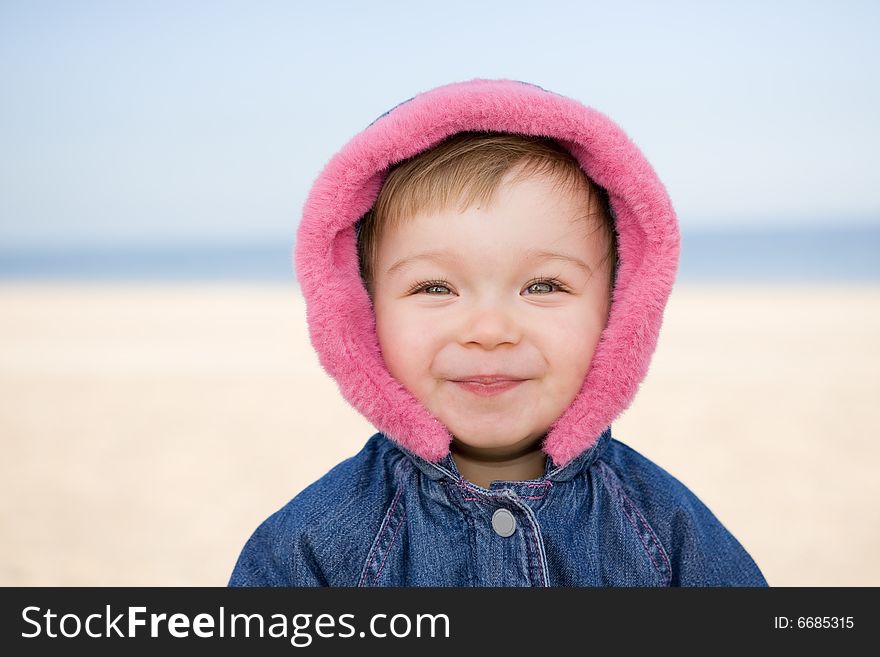 Portrait of sweet and happy baby girl outdoor