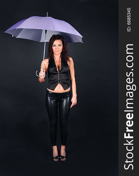 Sexy girl with umbrella on street