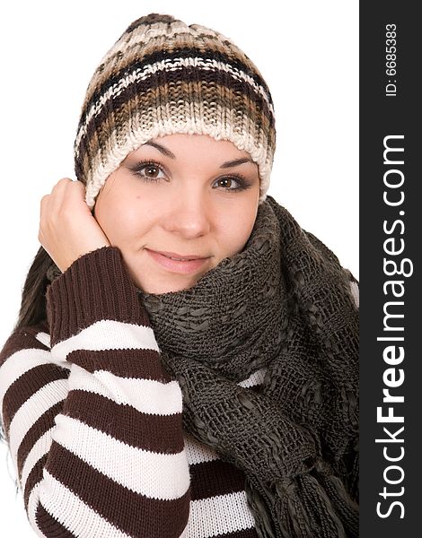 Attractive brunette winter woman. Over white background