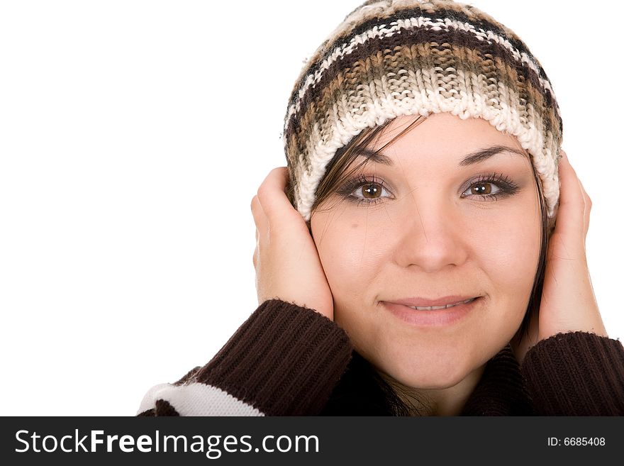 Attractive brunette winter woman. Over white background