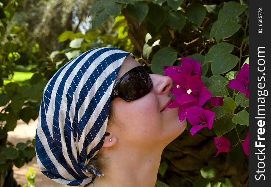 Violet flowers on the tree and beauty young women. Violet flowers on the tree and beauty young women.