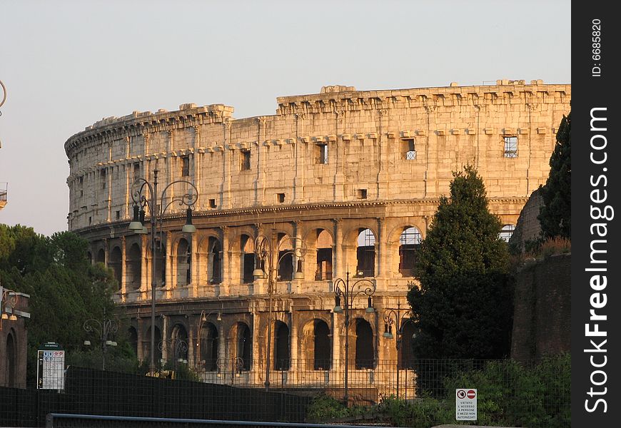 View of the Colosseum in Rome at sunset