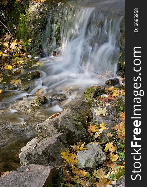 Autumn waterfall in ukrainian national park.