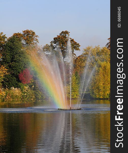 Beautiful fountain and lake in autumn