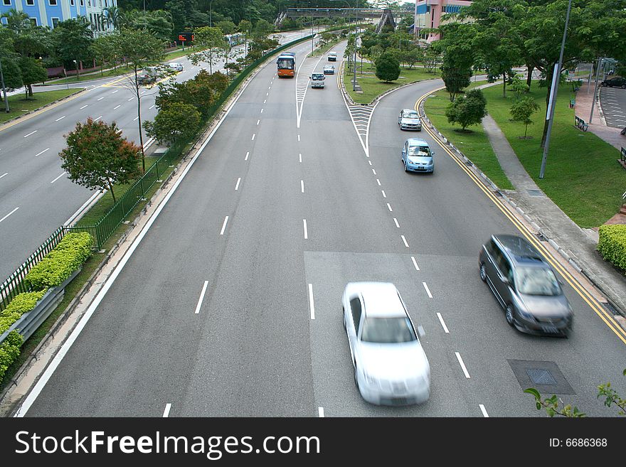 Four laned road/highway view from overhead bridge