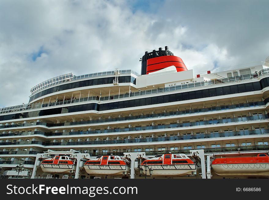 Big cruise ship docked in a port. Big cruise ship docked in a port.