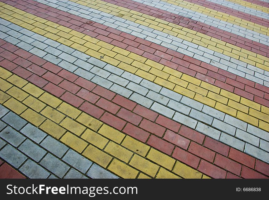 Multicolor brick pavement texture perspective shot