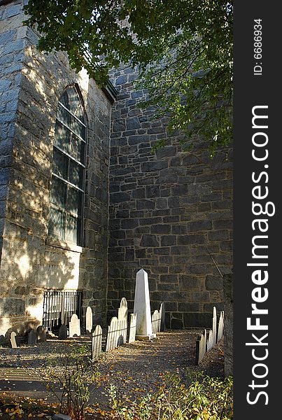 Small mysterious graveyard at the small church