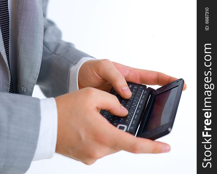 Close up of middle aged business man using cell phone. Close up of middle aged business man using cell phone