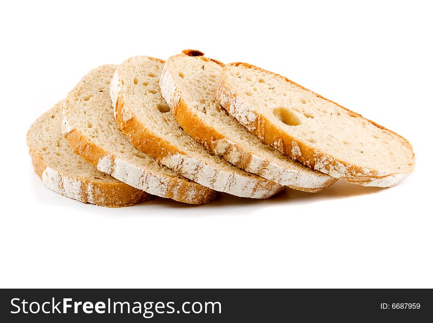 Five slices of white bread on the white background