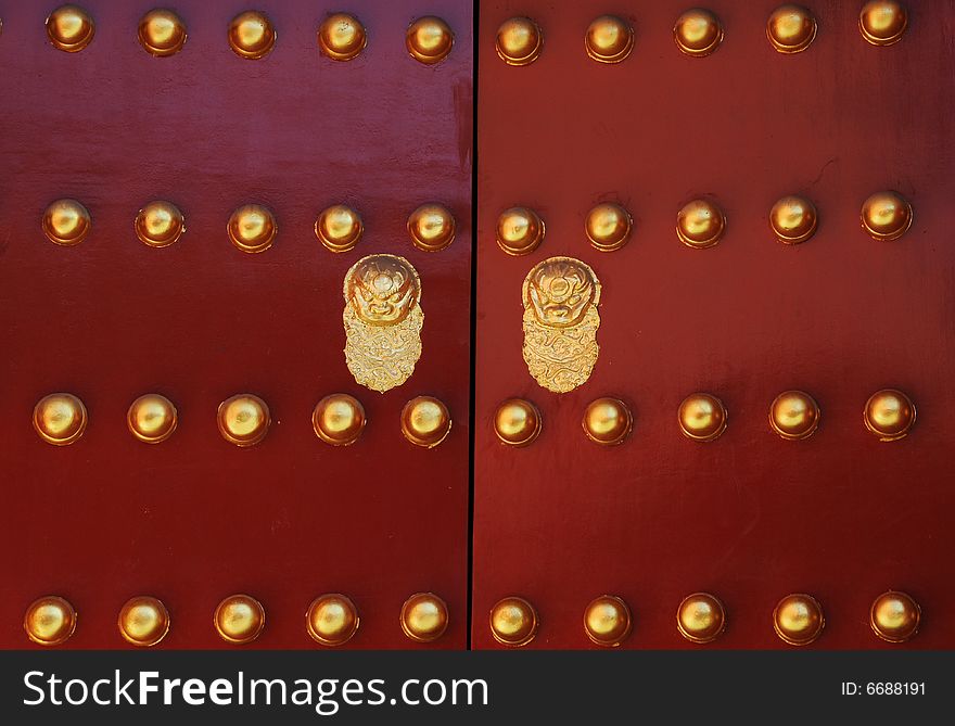 Decorated door of ancient chinese building, door with dragon decorations. Decorated door of ancient chinese building, door with dragon decorations