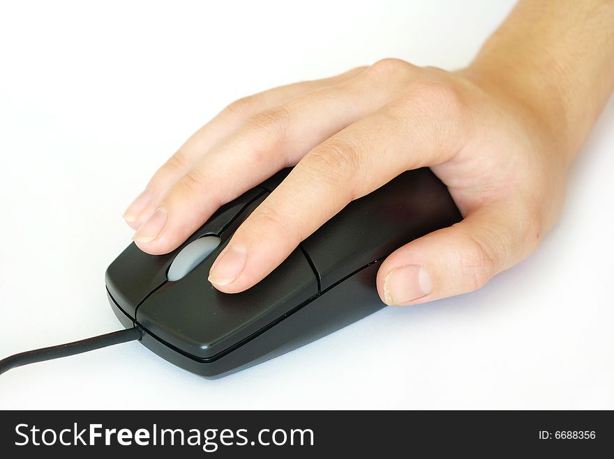 Black computer mouse in hand
