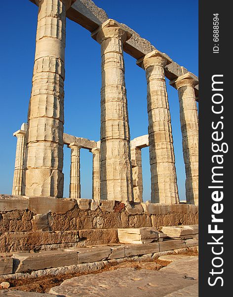 Columns from the  temple of Poseidon at cape Sounio in  Greece. Columns from the  temple of Poseidon at cape Sounio in  Greece