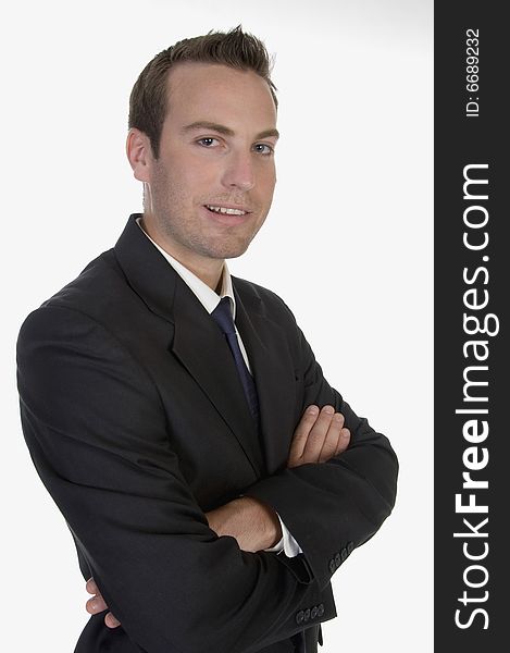 Young businessman posing on an isolated white background