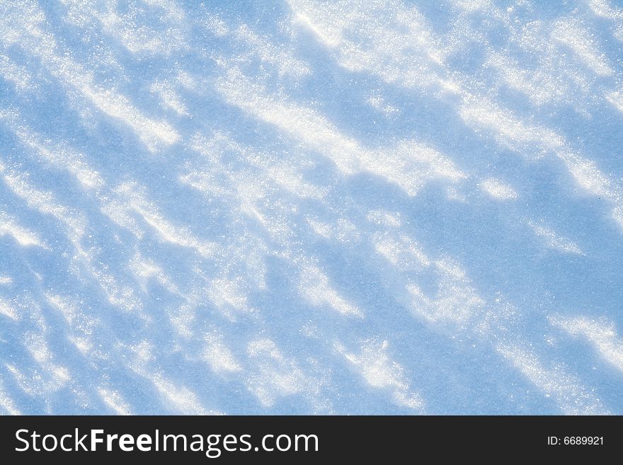 Fresh snow background in solar day