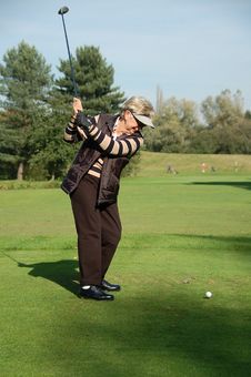 Female Golfer Teeing Off Stock Images Female Golfer Teeing Off Stock Images