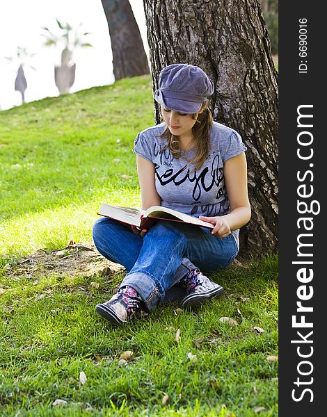 Young woman enjoying a book. Young woman enjoying a book