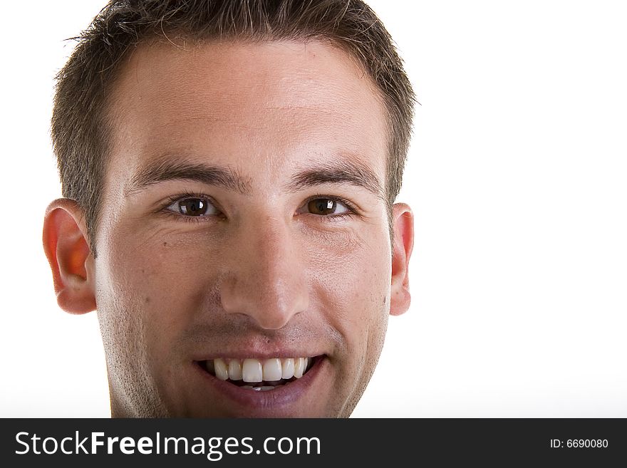 A nice young man smiling in closeup. A nice young man smiling in closeup