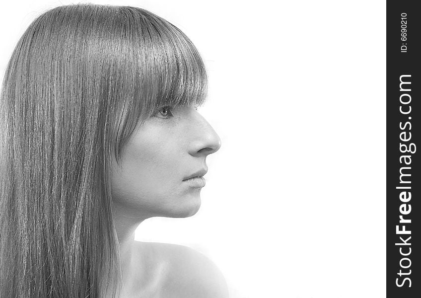 Portrait of the nice young girl with long hair over white. Portrait of the nice young girl with long hair over white