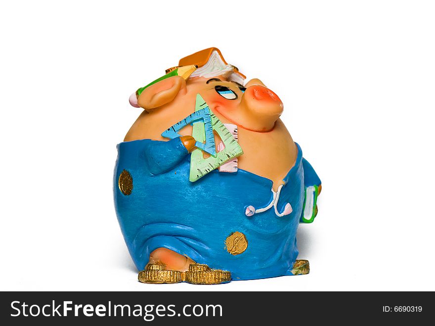 Funny pig money-box on the white isolated background