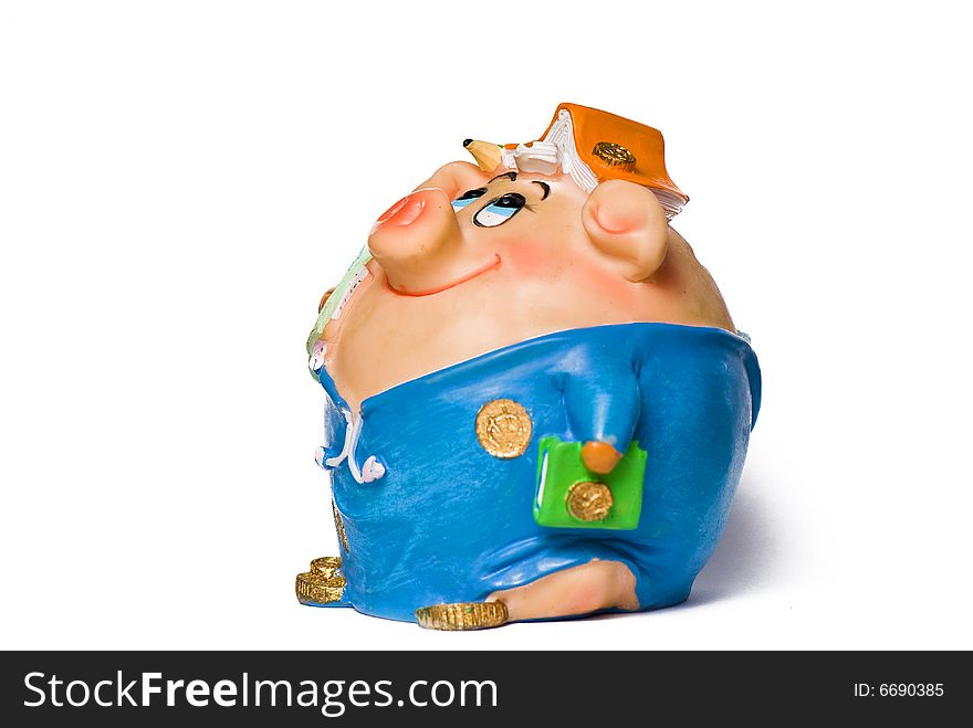 Funny pig money-box on the white isolated background