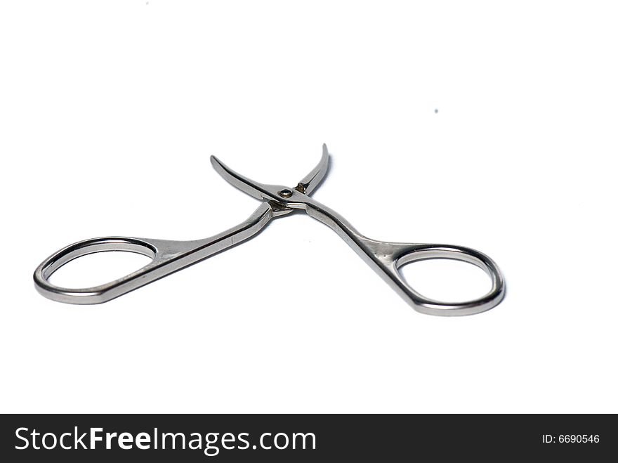 Metallic tongs on the white isolated background