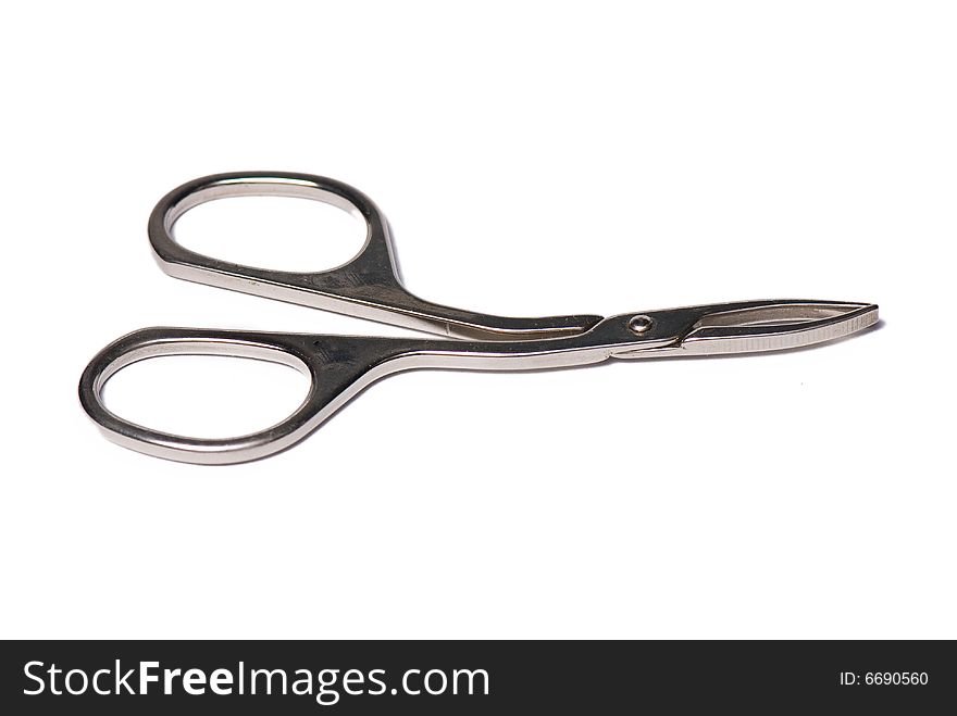 Metallic tongs on the white isolated background