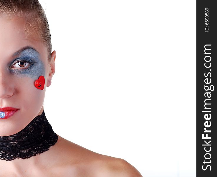 Portrait of a beautiful woman with blue eyeshadow and patch. Portrait of a beautiful woman with blue eyeshadow and patch