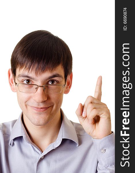 Young man with a finger up on white background