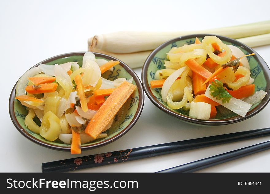 A meal of fresh vegetables like pepper and carrots