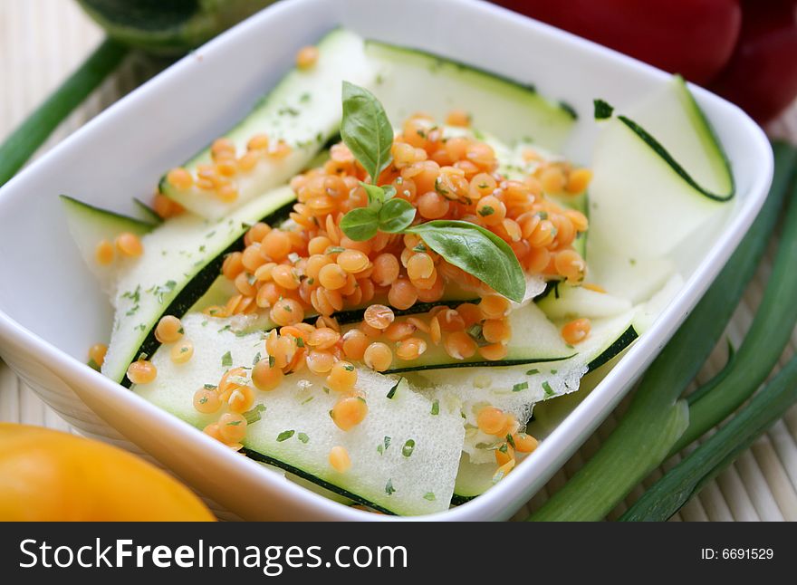 A fresh salad of zucchini and red lentils