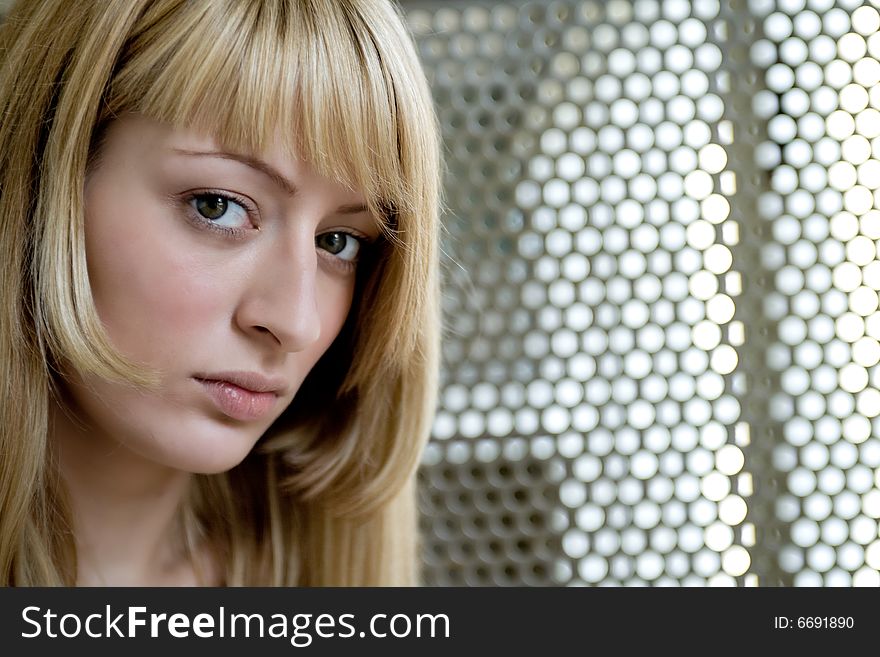 Portrait of a beautiful girl making eye contact. Portrait of a beautiful girl making eye contact