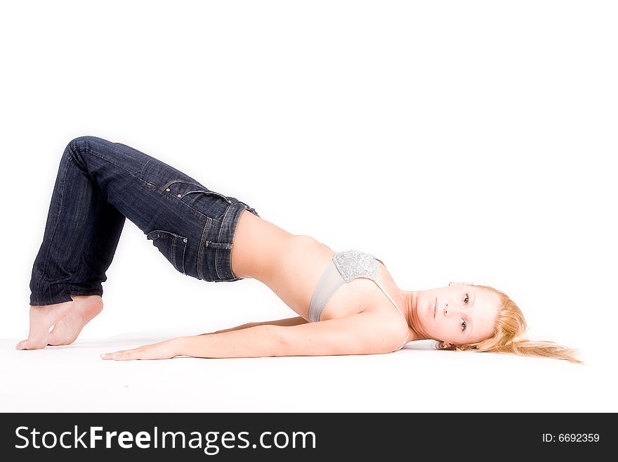 Young Blond Girl In Lingerie Stretching