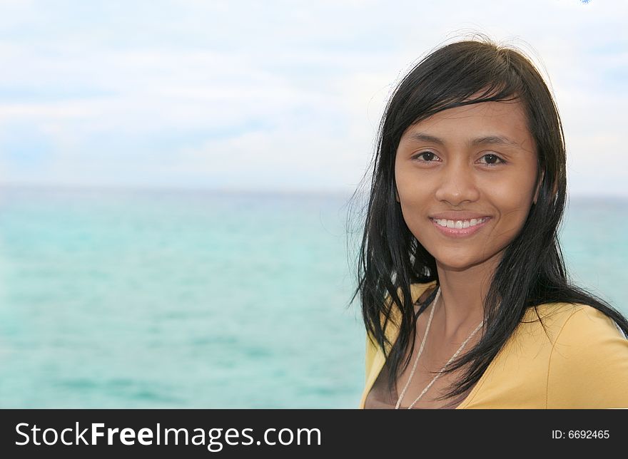 Photograph of asian girl near by beach. Photograph of asian girl near by beach