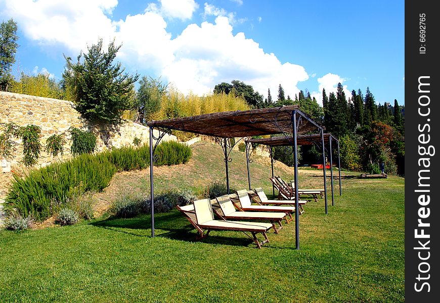 A suggestive and relaxing shot of a natural solarium in Tuscany countryside. A suggestive and relaxing shot of a natural solarium in Tuscany countryside