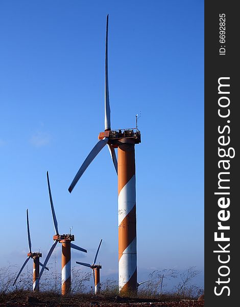 Wind turbine making green electricity. Wind turbine making green electricity